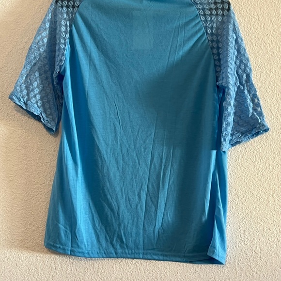 Blue lace three quarter sleeve top
Size large
Floral blooming - Picture 8 of 9